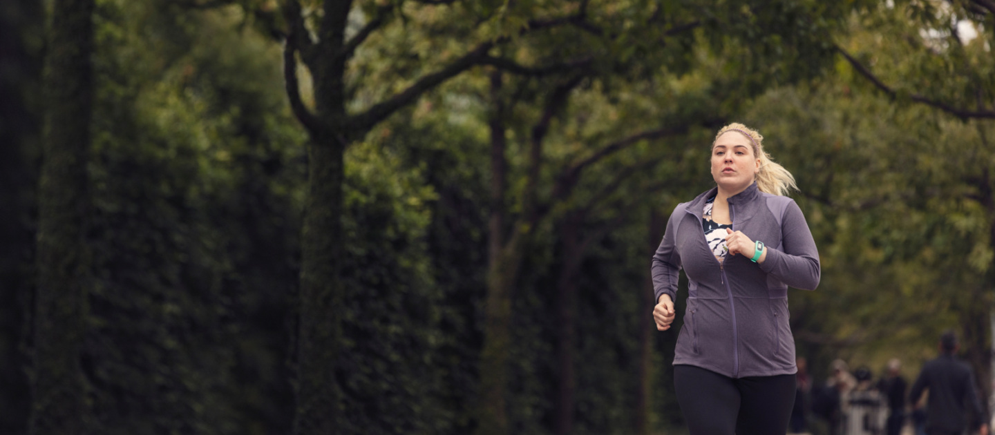Woman running in a park