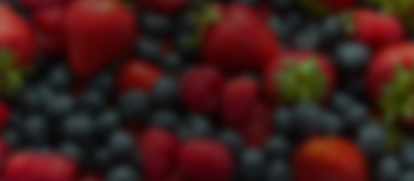 strawberries and blueberries blurred