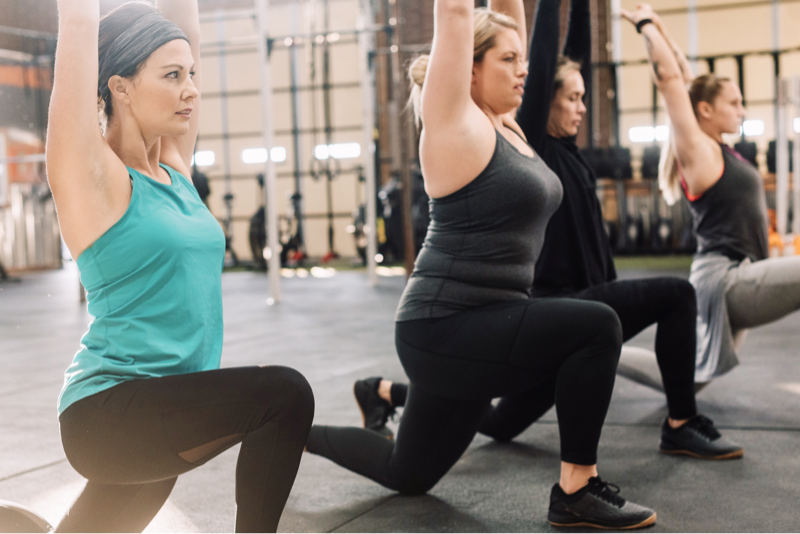 Women exercising together in a gym class