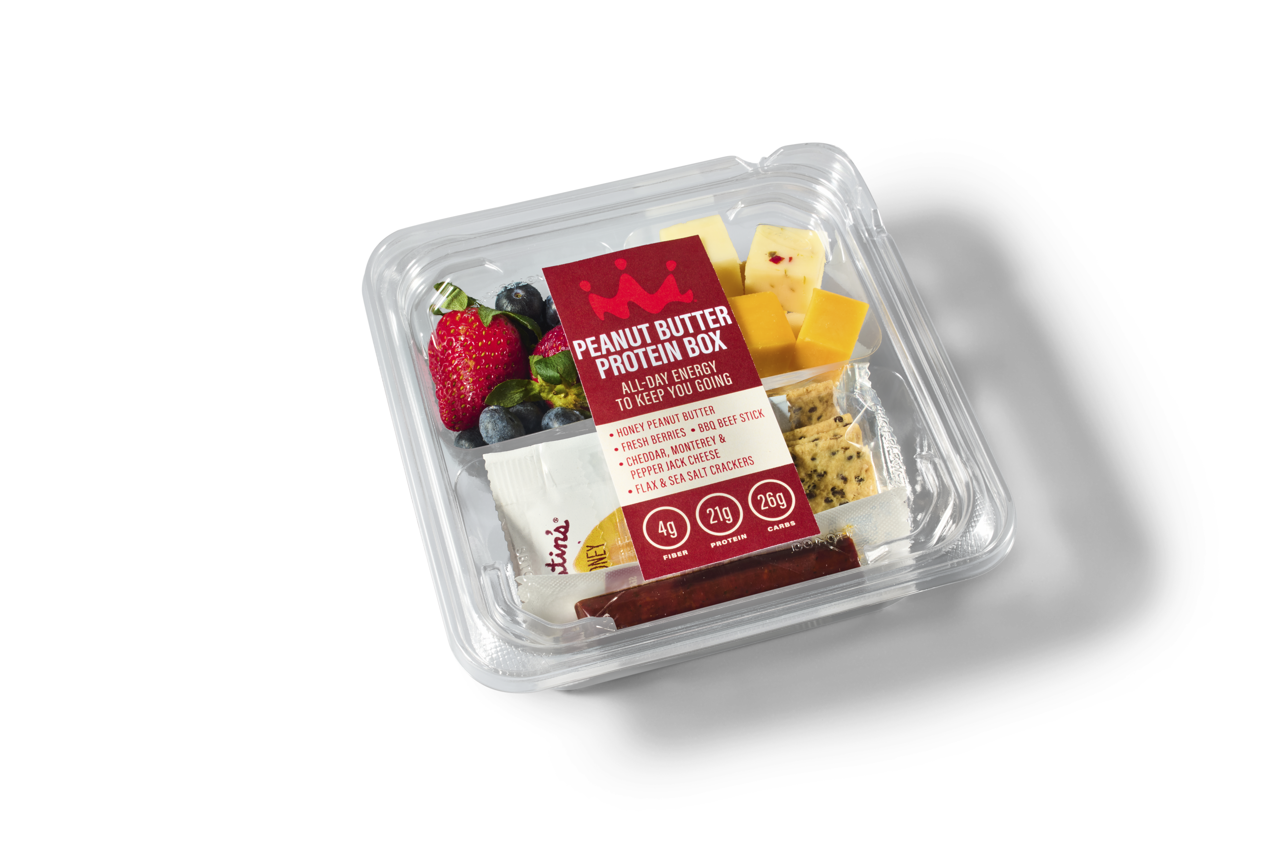 Peanut butter protein box with berries, cheese, crackers, and a beef stick from Smoothie King