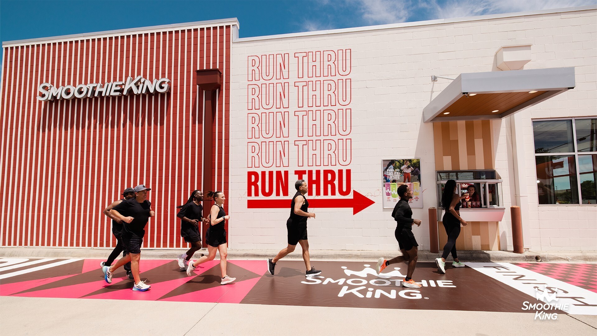 Runners passing through Smoothie King's Run-Thru