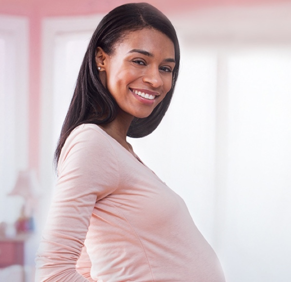 Sk-premama-companion-image-womany-holding-belly