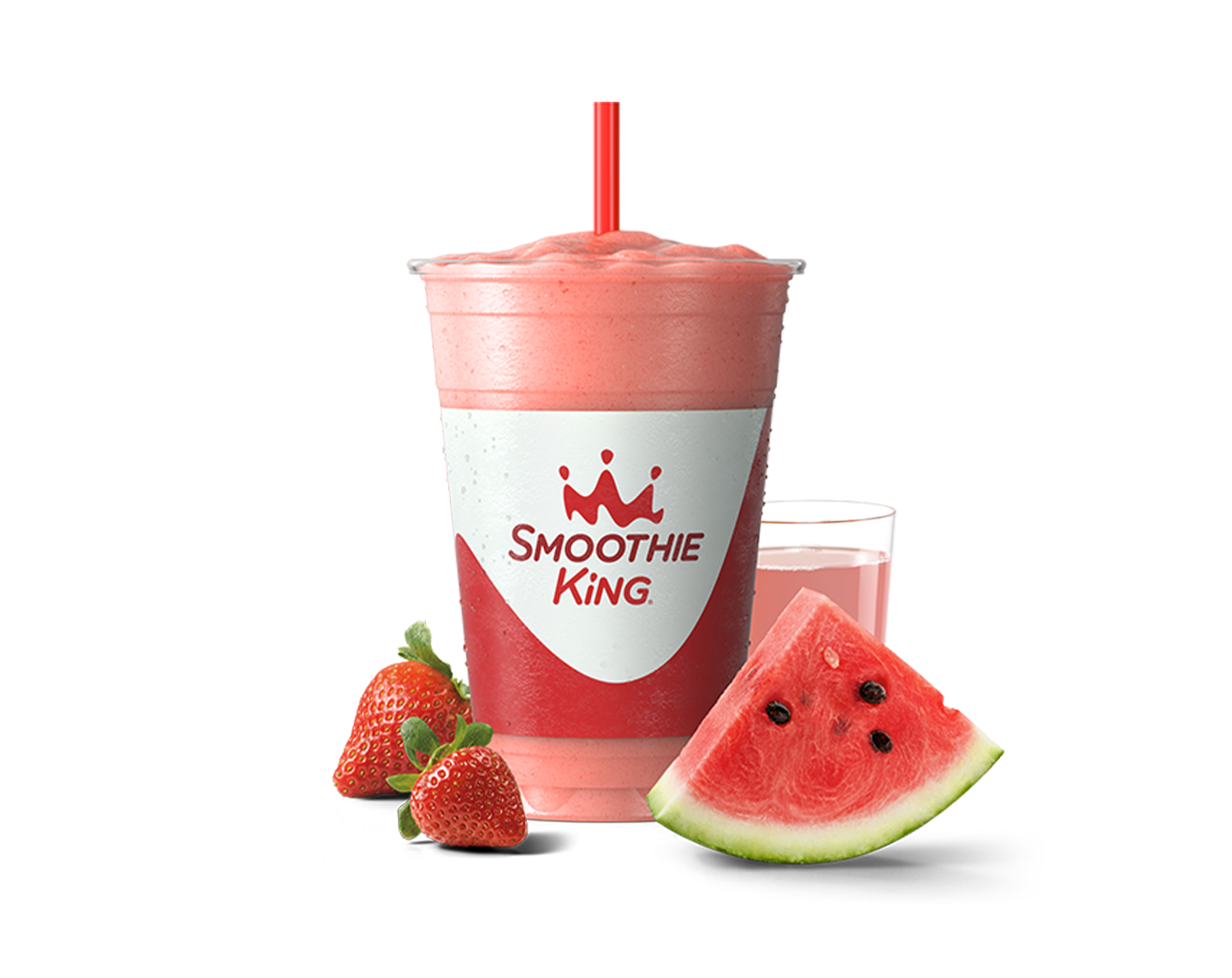 A healthy smoothie with strawberries and a slice of watermelon sitting beside it